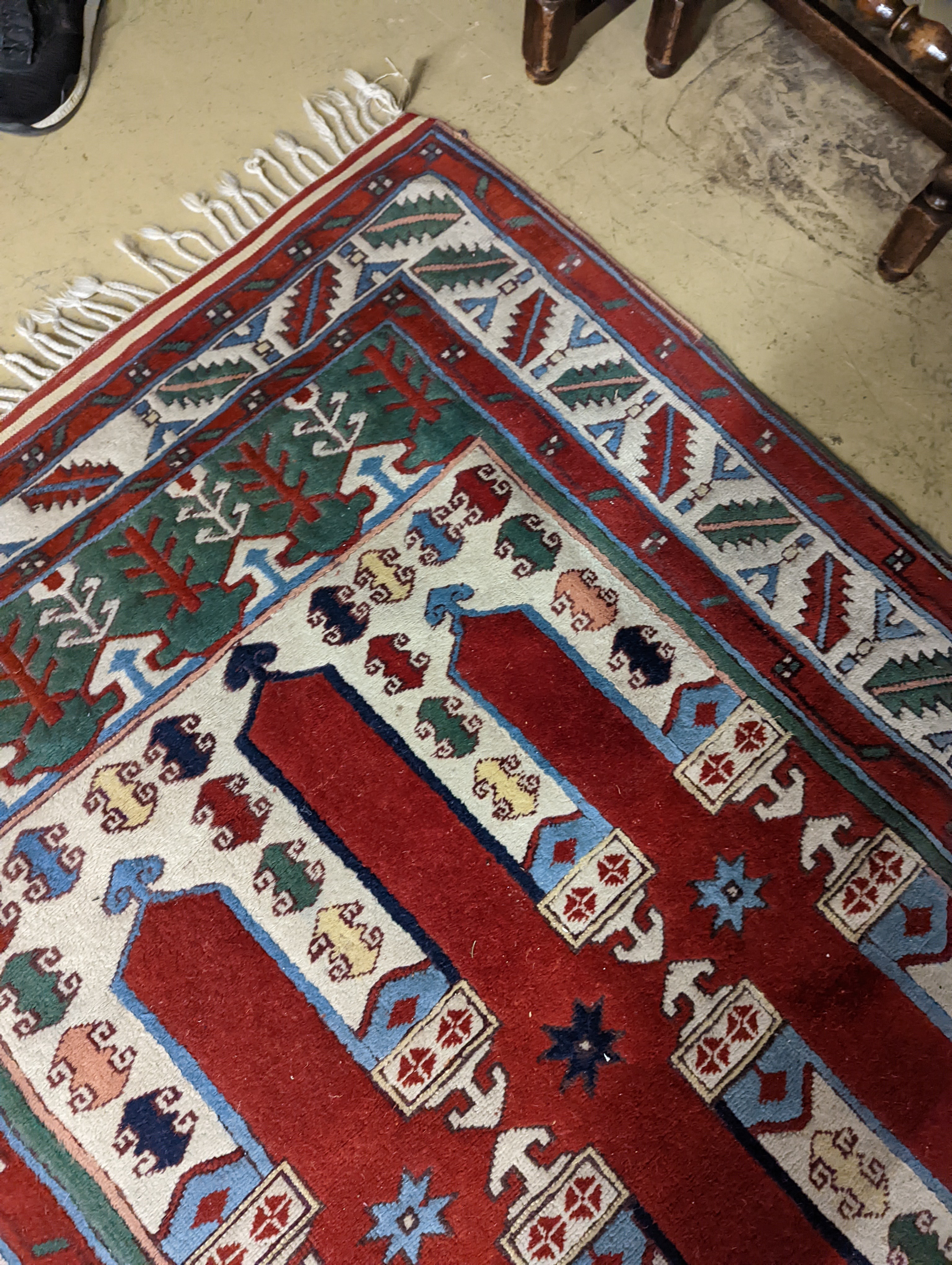 Two Turkish rugs and a Persian rugs. Largest, 284x172cm.